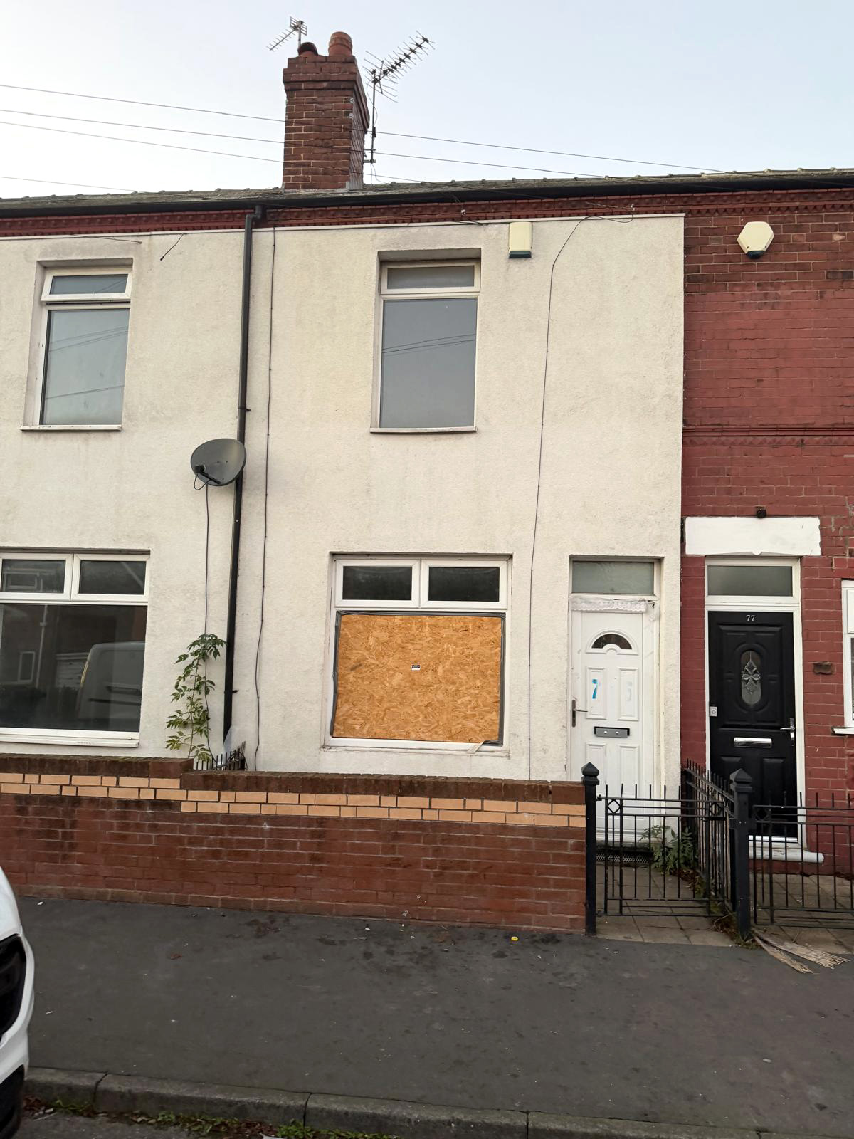 A boarded-up terraced property supplied by Zenith Living